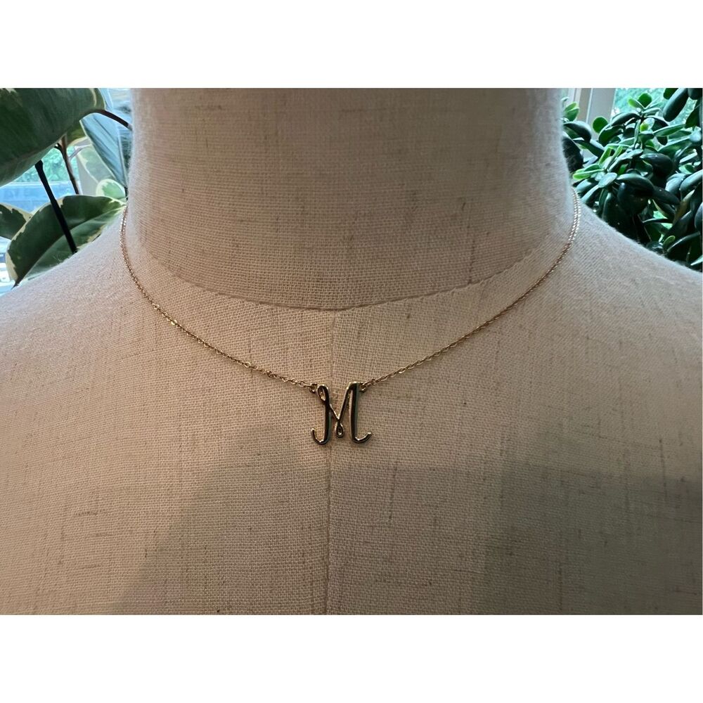 Crown and Ivy “M” gold tone initial necklace